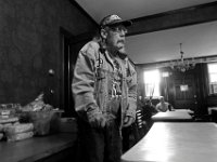 Army veteran, Ronald Yurkvievich stands attention during roll call in the morning at the Veterans Transition House currently housed at the rectory of the now closed St. John church on County Street in New Bedford, MA.  PHOTO PETER PEREIRA
